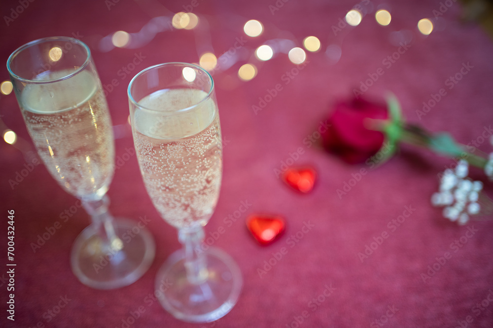 valentines day glasses of champagne close up and lights valentines day glasses of champagne close up and lights