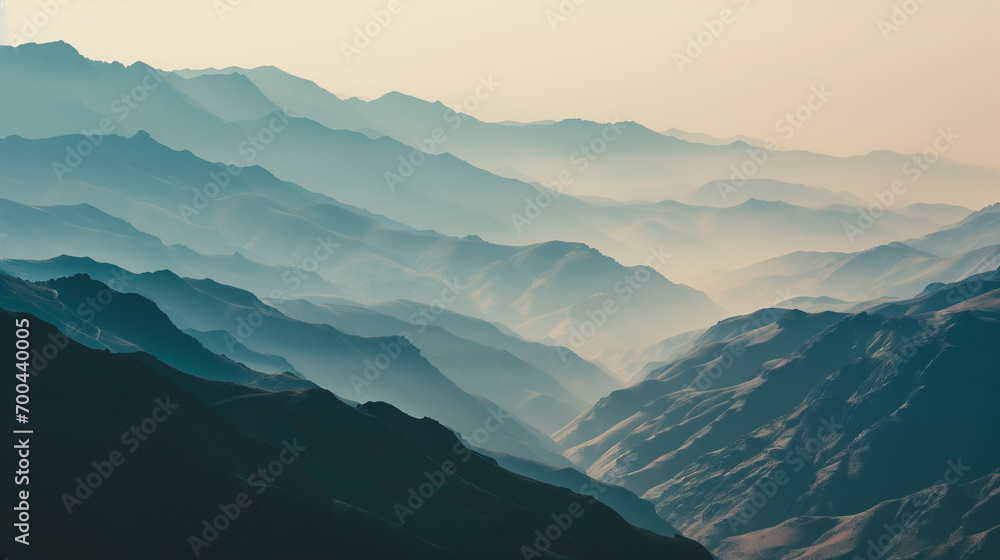 Mountains in the fog, blue background