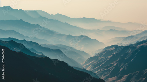 Mountains in the fog, blue background