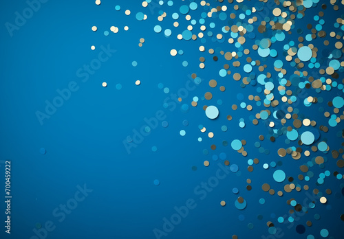 Holiday Decor. Vibrant gold confetti on blue background. Festive design with copy space for your text. Metallic glitter foil confetti on blue.