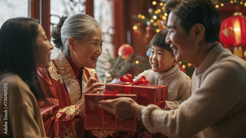 Capture the warmth of family gatherings with an image of generations exchanging gifts  emphasizing the joy and unity during Chinese New Year celebrations.