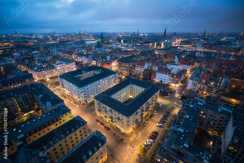 Aerial evening view of Copenhagen buildings and lights