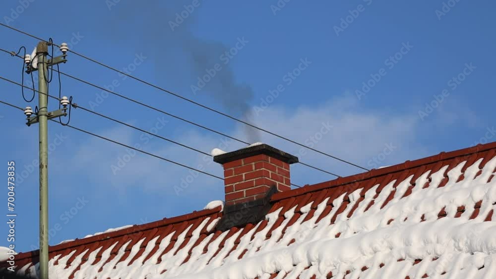 Video of urban air pollution, Smoke coming out of a brick chimney on a tiled roof with snow on in winter, bright sunshine, blue sky, Video of urban air pollution, Smoke coming out of a brick chimney on a tiled roof with snow on in winter, bright sunshine, blue sky,