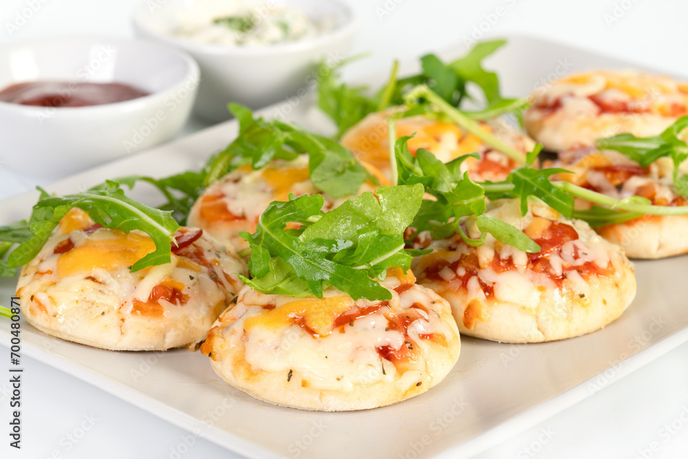 Mini pizza party snacks on a plate Mini pizza party snacks on a plate
