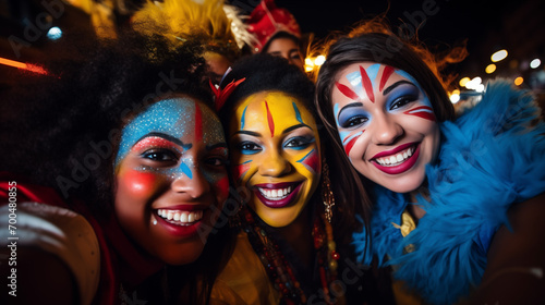 Wallpaper Mural Group of joyful friends with yellow paint on faces celebrating at a festival, embodying happiness and unity. Torontodigital.ca