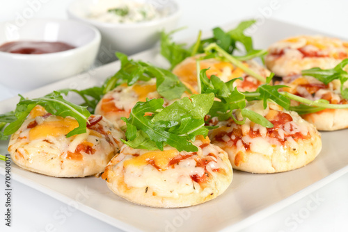 Mini pizza party snacks on a plate
