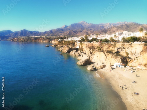 Photograph of tourist spaces in the town of Nerja, Málaga, one of the white villages of Andalusia, Spain, Calahonda beach, photography from the balcony of Europe, Mediterranean Sea, 