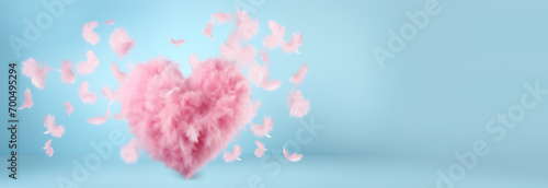 Valentine romantic pink feather heart floats on a light blue pastel background with copy space. Banner for Valentine's Day. Valentine's Day concept template for text.