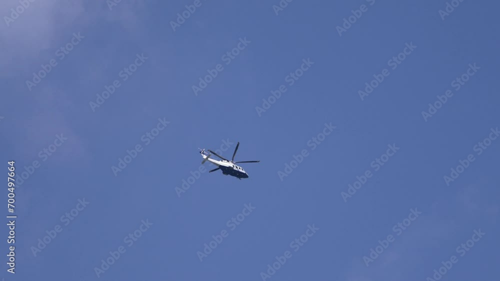 Helicopter flight on the sky in 4k slow motion 60fps Helicopter flight on the sky in 4k slow motion 60fps