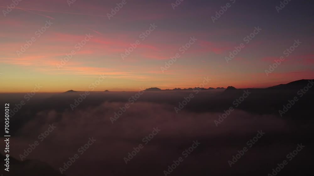 Flying over Como lake at sunset with Monte Rosa massif on the horizon Flying over Como lake at sunset with Monte Rosa massif on the horizon