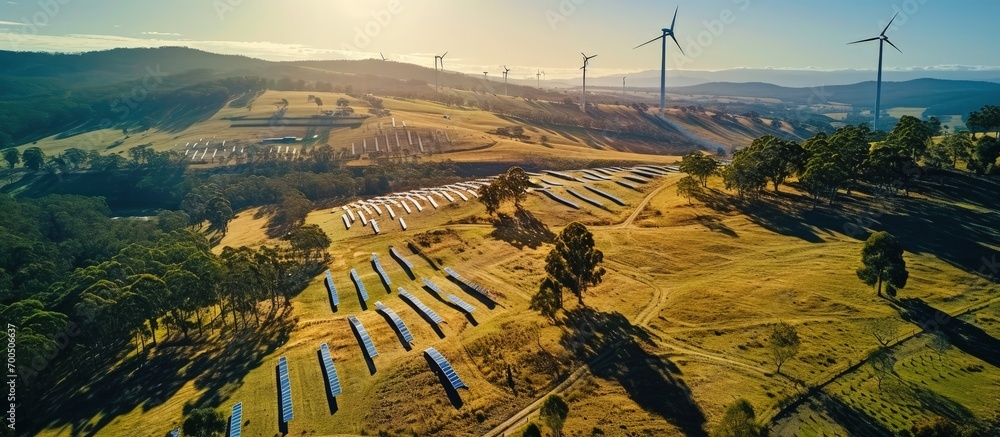 Aerial drone view of the hybrid Gullen Solar Farm and Gullen Range Wind Farm for renewable clean energy supply located at Bannister in the Upper Lachlan Shire NSW Australia. Creative Banner - obrazy, fototapety, plakaty 