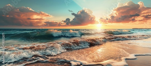 Fototapeta Naklejka Na Ścianę i Meble -  Closeup sea sand beach Panoramic beach landscape Inspire tropical beach seascape horizon Orange and golden sunset sky calmness tranquil relaxing sunlight summer mood Vacation travel holiday ban