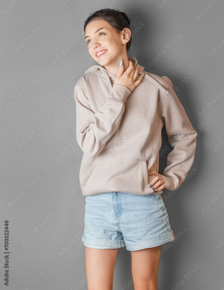Portrait of a young pretty girl in a hoodie Portrait of a young pretty girl in a hoodie
