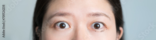 woman made a mistake when using mascara and it smeared on her eyelids