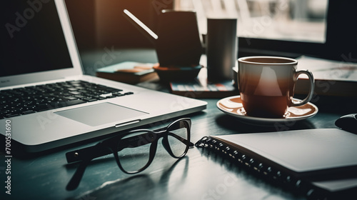 Offce essential on table with coffee cup