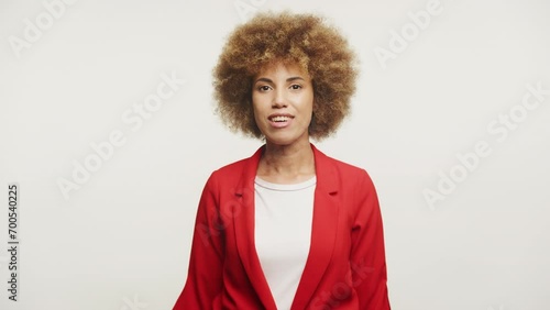 Cheerful Young Woman in Red Blazer