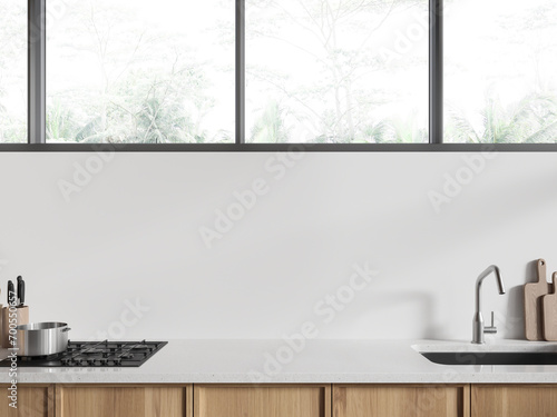 White hotel kitchen interior with cabinet, sink and kitchenware with window