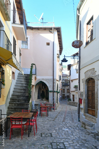 A narrow street among the old houses of Monte San Biagio, a medieval village in the mountains of Lazio, Italy.