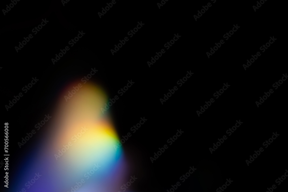 Blur colorful rainbow crystal light leaks on black background. Defocused abstract multicolored retro film lens flare bokeh analog photo overlay or screen filter effect. Glow Vintage prism colors Blur colorful rainbow crystal light leaks on black background. Defocused abstract multicolored retro film lens flare bokeh analog photo overlay or screen filter effect. Glow Vintage prism colors