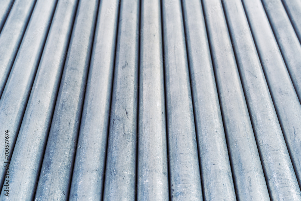Set of steel tubes as industrial background Set of steel tubes as industrial background