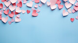 Imagen de San Valentín con corazones recortados de papel en fondo azul.
