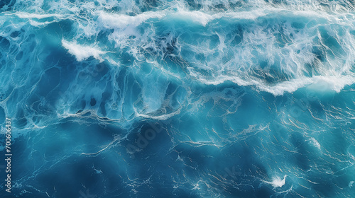 blue ocean small waves as background. top view, drone footage 
