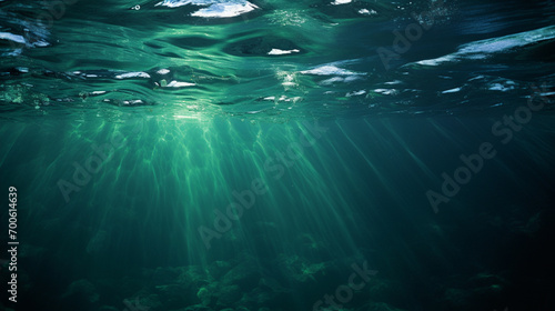 A conceptual image of the worldвАЩs oceans, depicted as layers of deep blues and greens with shimmering light.