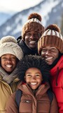 A happy African-American family comes together in the winter outdoors, capturing warmth and togetherness in a heartwarming portrait. Vertical shot