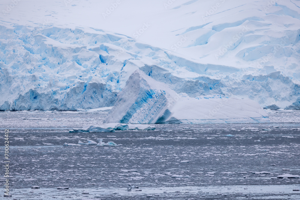 Blue ice showing in the snow in Antarctica.