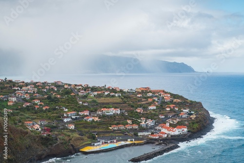 Punta Delgada, Madeira - Coastal architecture blending with nature's scenic beauty - horizon to shore.