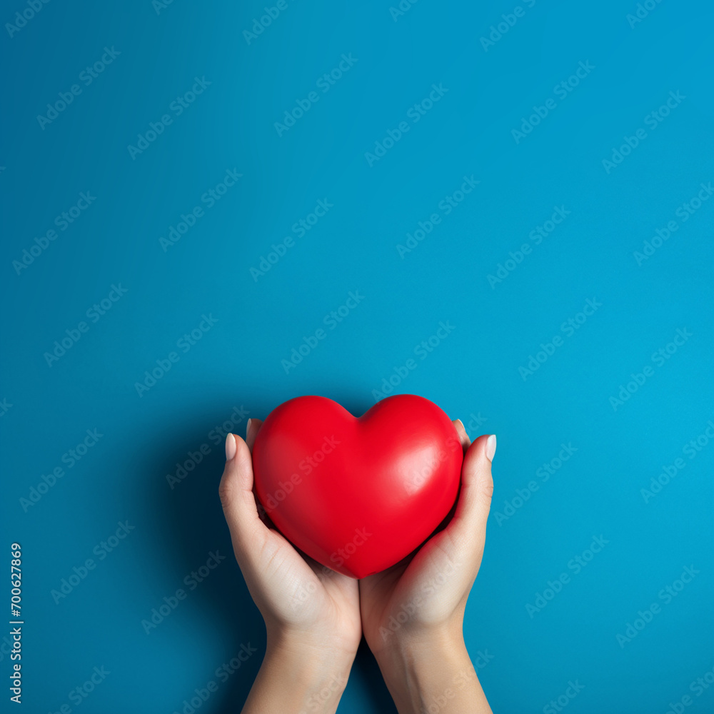 The essence of love with hands presenting a red heart on a serene blue background, an eloquent symbol of affection. Generative AI. The essence of love with hands presenting a red heart on a serene blue background, an eloquent symbol of affection. Generative AI.