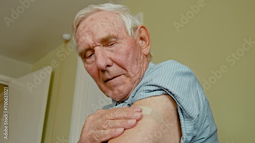 Photo of charming mature man dressed white t-shirt showing thumb up recommending vaccination
