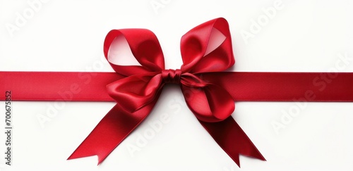 red ribbon with bow isolated on white background