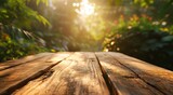 wooden table top on landscape background in blurry sunlight