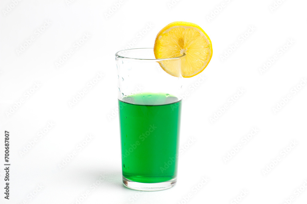 Glass with pure water and lemon on a white background Glass with pure water and lemon on a white background