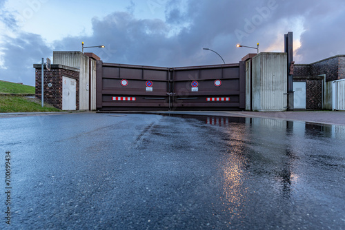 closed flood gate seen from the landside during storm surge in Cuxhaven, Germany photo