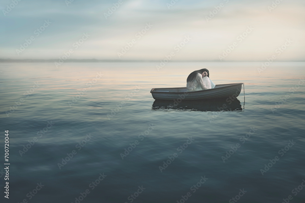 Photography lonely woman on a small boat in the middle of the sea, loneliness concept