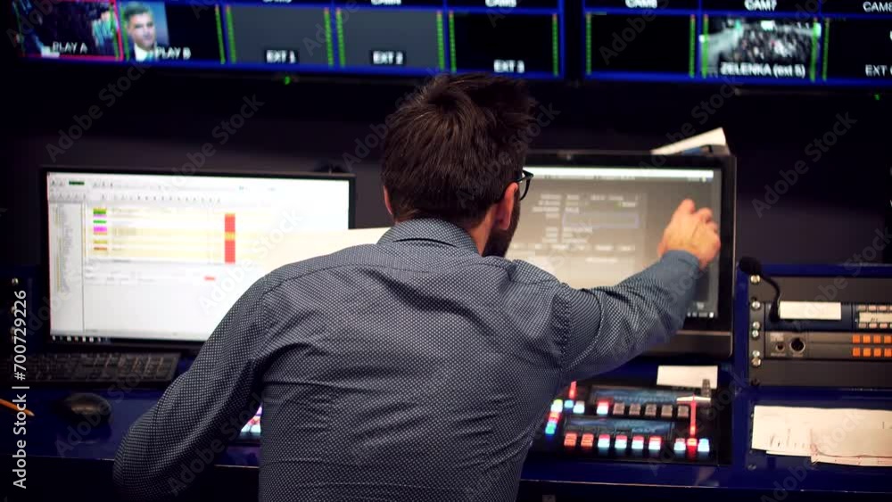 Studio director on video mixer broadcast TV station