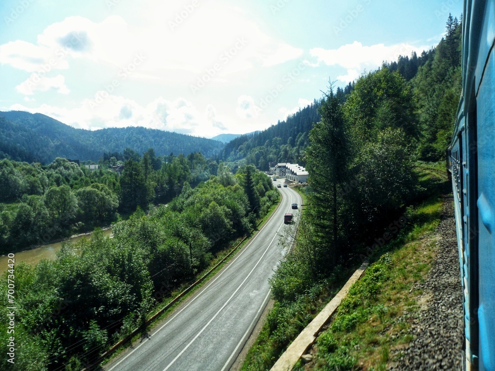 An exciting trip by train to the mountains in the summer An exciting trip by train to the mountains in the summer