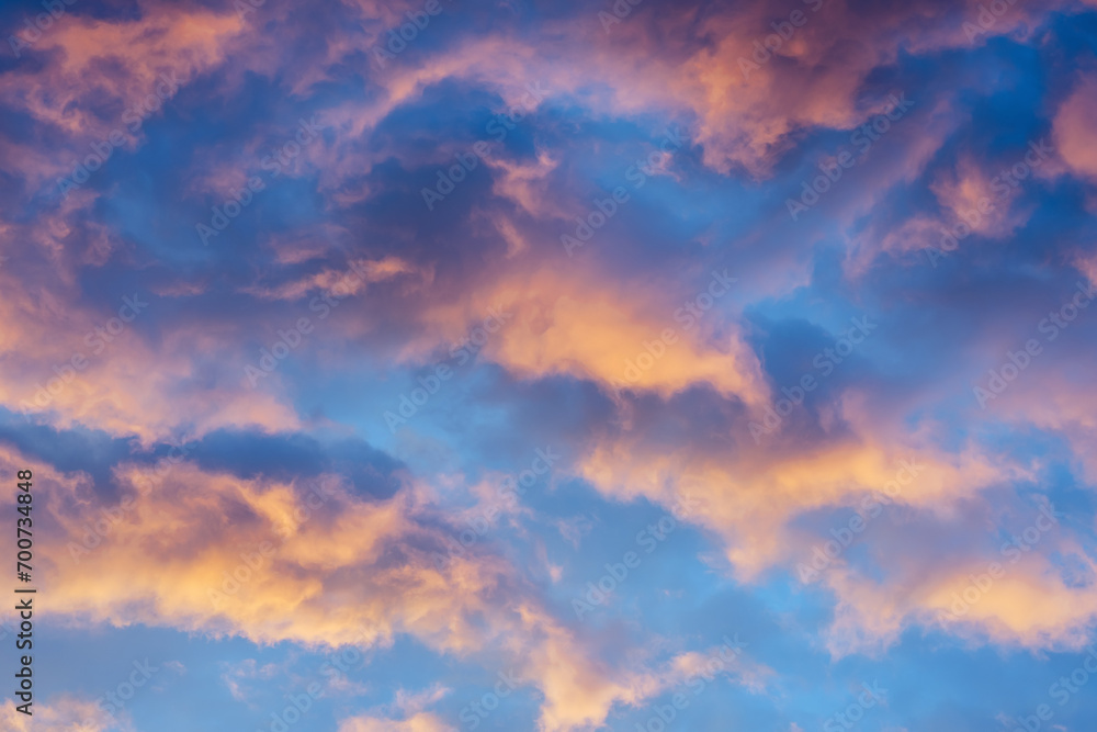 Colorful clouds against blue sky during sunset or sunrise