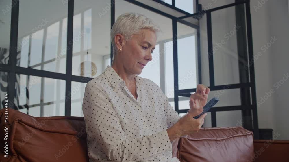 Senior Professional Using Smartphone Indoors Senior Professional Using Smartphone Indoors