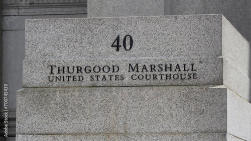 outside the Thurgood Marshall United States Courthouse in Manhattan as the jury deliberates photo