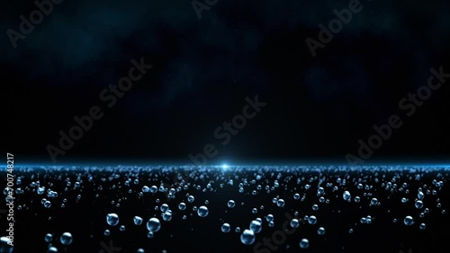 This motion stock graphic shows a field of air bubbles on a dark blue background. photo