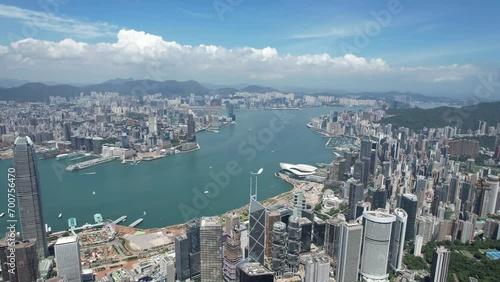 Hong Kong Convention and Exhibition Centre in Wan Chai Central Admiralty Causeway Bay CBD facing Victoria Harbour Kowloon Tsim Sea Tsui ,4K drone shot of property commercial area  photo