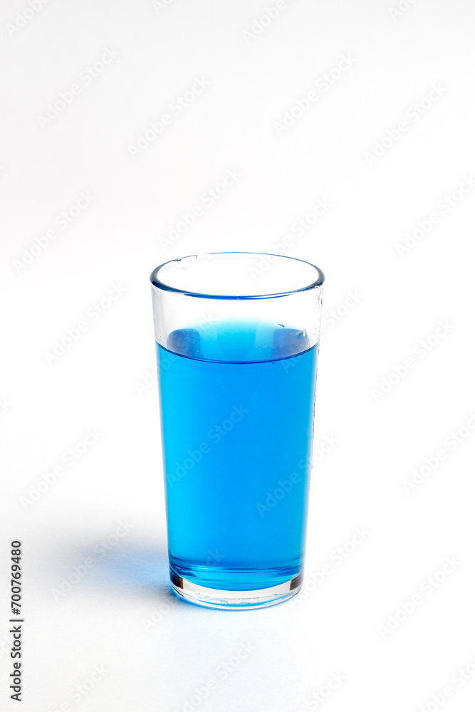 Glass with water on a white background Glass with water on a white background
