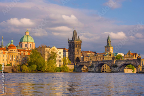 Obraz na płótnie Charles Bridge (Karluv Most) on Vltava river and Old Town Bridge Tower, famous tourist destination in Prague, Czech Republic (Czechia), at sunset w salonie