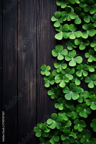 Clover leaves on black wooden background. Generative AI.