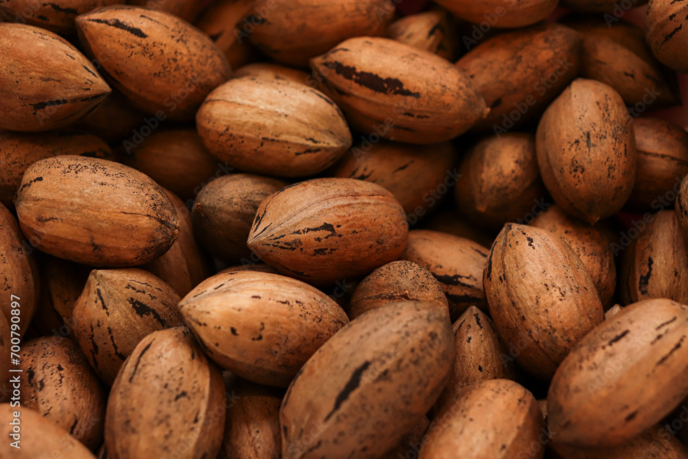 Pecans closed whole nuts pile background texture Pecans closed whole nuts pile background texture