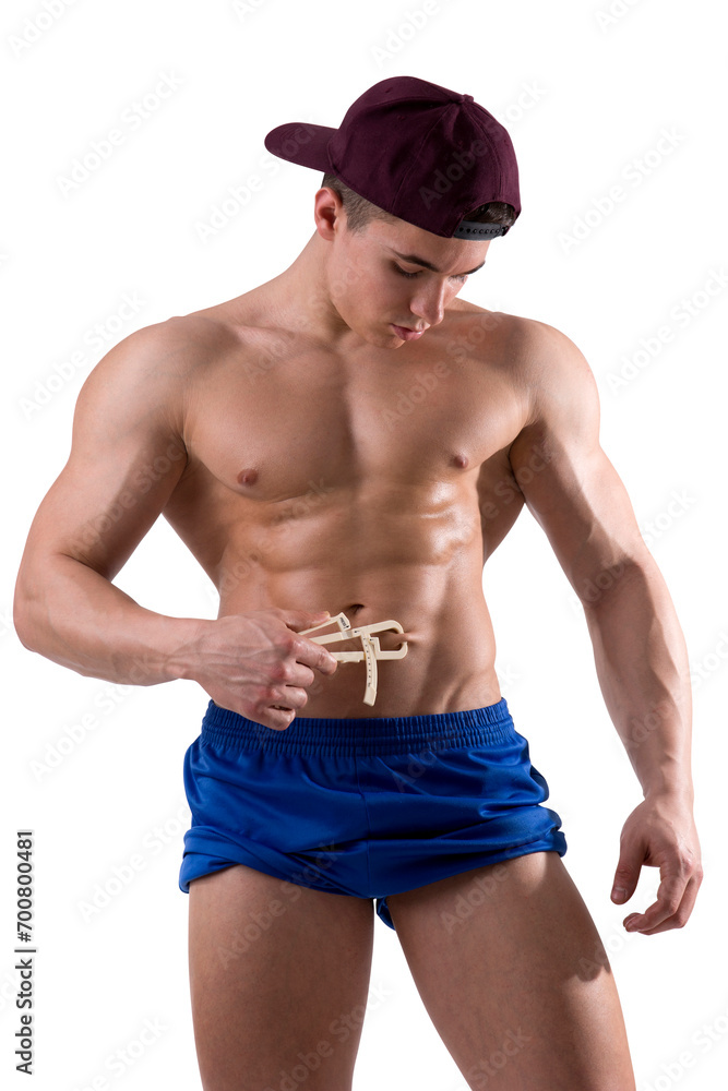 A shirtless man with no shirt using a caliper to measure his body fat percentage