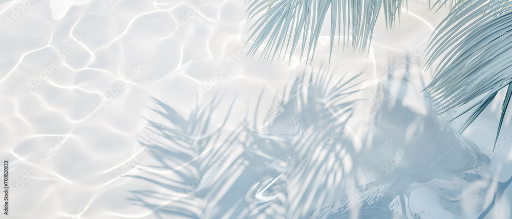 Top view of tropical leaf shadow on water surface. Shadow of palm leaves on white sand beach. Beautiful abstract background concept banner for summer vacation at the beach. - obrazy, fototapety, plakaty 